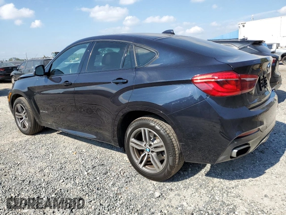 2015 BMW X6 xDrive50i with VIN 5UXKU6C50F0F94199, listed as a Copart auction lot 70680312 with 106,650 mi miles. Bid and sale history available at carsss.com. Image 2.