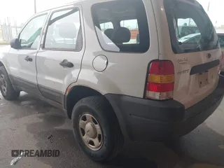 2004 Ford Escape XLS with VIN 1FMYU02134DA08567, listed as a IAAI auction lot 41872076 with 239,602 mi miles and . Bid and sale history available at DreamBid. Image 3.