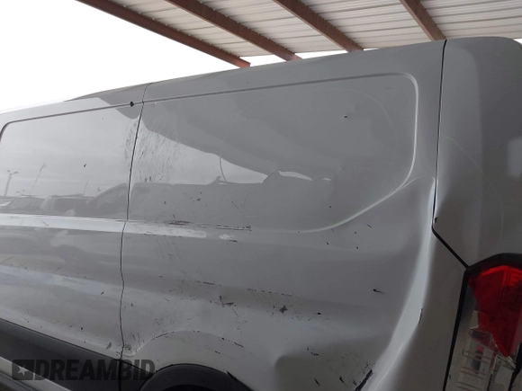 2019 Ford Transit with VIN 1FTYE1ZM2KKB46391, listed as a IAAI auction lot 41362328 with 128,327 mi miles and . Bid and sale history available at carsss.com. Image 18.
