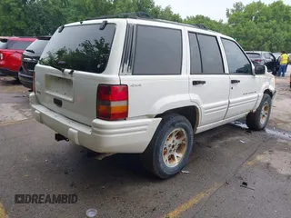 1997 Jeep Grand Cherokee Limited z VIN 1J4GZ78S1VC536295, wystawiony jako IAAI lot #42435292 z przebiegiem 310 005 mil mil oraz . Historia ofert i sprzedaży dostępna na DreamBid. Obrazek 4.