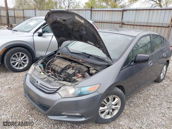 2010 Honda Insight EX with VIN JHMZE2H7XAS024879, listed as a IAAI auction lot 42029553 with 187,648 mi miles. Bid and sale history available at carsss.com. Image 6.
