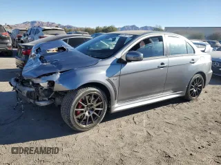 2015 Mitsubishi Lancer Evolution Final Edition with VIN JA32W7FV0FU027962, listed as a Copart auction lot 85763774 with 56,671 mi miles and Salvage Title. Bid and sale history available at carsss.com. Image 1.