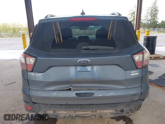 2018 Ford Escape SEL with VIN 1FMCU0HD1JUC04403, listed as a IAAI auction lot 41993351 with 91,880 mi miles and . Bid and sale history available at carsss.com. Image 17.