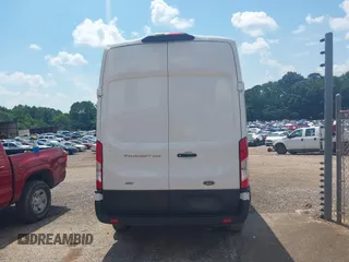 2023 Ford Transit Cargo with VIN 1FTBR2X81PKB38408, listed as a IAAI auction lot 42608271 with 28,384 mi miles and . Bid and sale history available at DreamBid. Image 16.