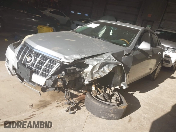 2012 Cadillac CTS Premium z VIN 1G6DS5E33C0139591, wystawiony jako IAAI lot #41985026 z przebiegiem 151 810 mil mil oraz . Historia ofert i sprzedaży dostępna na DreamBid. Obrazek 17.