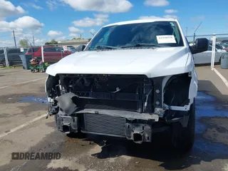 2015 Ford F-150 XL with VIN 1FTMF1CP9FFA42316, listed as a IAAI auction lot 41938558 with 69,297 mi miles. Bid and sale history available at carsss.com. Image 6.