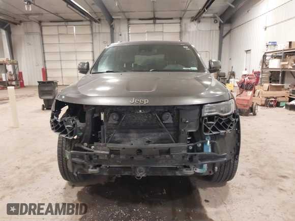 2016 Jeep Grand Cherokee Limited 75th Anniversary with VIN 1C4RJFBG2GC349154, listed as a IAAI auction lot 41392239 with 135,627 mi miles and . Bid and sale history available at DreamBid. Image 12.
