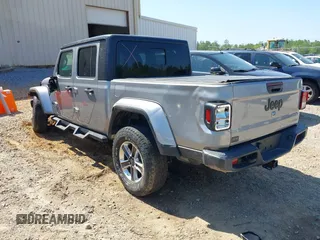 2021 Jeep Gladiator Willys z VIN 1C6HJTAG6ML507039, wystawiony jako IAAI lot #42057637 z przebiegiem 69 443 mil mil oraz . Historia ofert i sprzedaży dostępna na DreamBid. Obrazek 3.