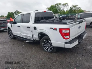 2023 Ford F-150 XL with VIN 1FTEW1EP5PFB87582, listed as a IAAI auction lot 42254015 with 10,476 mi miles and . Bid and sale history available at DreamBid. Image 3.