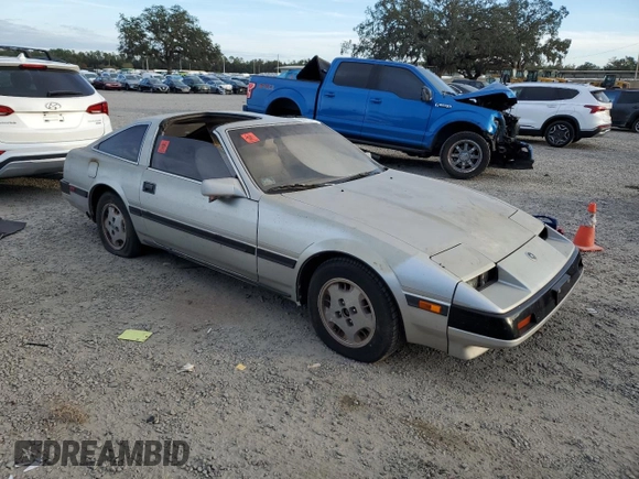 1984 Nissan 300ZX z VIN JN1HZ16S5EX016042, wystawiony jako Copart lot #86071904 z przebiegiem Nie podano mil oraz Szkoda całkowita • Salvage title. Historia ofert i sprzedaży dostępna na DreamBid. Obrazek 4.