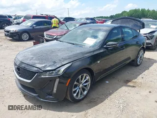 2024 Cadillac CT5 Sport z VIN 1G6DP5RK3R0127081, wystawiony jako IAAI lot #42319697 z przebiegiem 4 093 mil mil oraz . Historia ofert i sprzedaży dostępna na DreamBid. Obrazek 19.