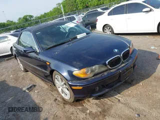 2001 BMW 3 Series 330Ci with VIN WBABS534X1EV86724, listed as a IAAI auction lot 42128593 with 153,296 mi miles. Bid and sale history available at carsss.com. Image 1.