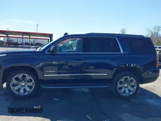 2017 GMC Yukon SLT with VIN 1GKS1BKC9HR356600, listed as a IAAI auction lot 41694218 with 155,855 mi miles. Bid and sale history available at carsss.com. Image 14.