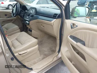 2007 Honda Odyssey Touring z VIN 5FNRL38867B076568, wystawiony jako IAAI lot #42355334 z przebiegiem 211 726 mil mil oraz . Historia ofert i sprzedaży dostępna na DreamBid. Obrazek 5.
