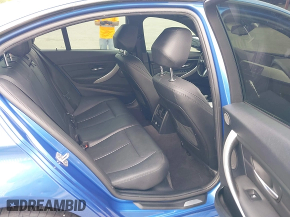 2015 BMW 3 Series 328i xDrive with VIN WBA3B3C57FJ985025, listed as a IAAI auction lot 42140398 with 134,643 mi miles and . Bid and sale history available at DreamBid. Image 8.