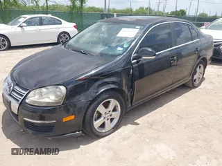 2009 Volkswagen Jetta SE with VIN 3VWRM71KX9M096599, listed as a IAAI auction lot 42727345 with 161,202 mi miles and . Bid and sale history available at DreamBid. Image 2.