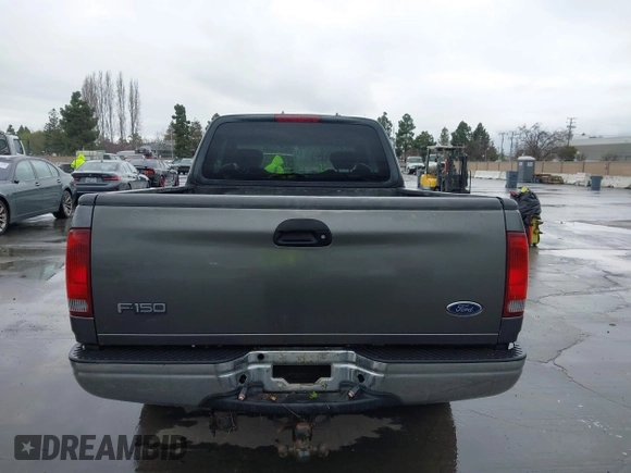 2003 Ford F-150 XL with VIN 1FTRX17W03NB51687, listed as a IAAI auction lot 41712022 with 183,428 mi miles. Bid and sale history available at carsss.com. Image 16.
