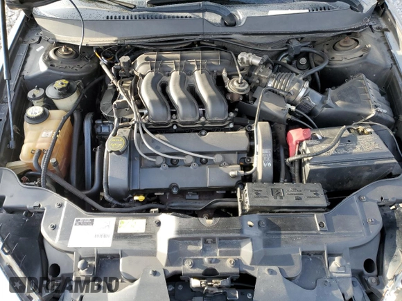 2002 Ford Taurus SE z VIN 1FAFP58S12G211216, wystawiony jako Copart lot #45158325 z przebiegiem 159 058 mil mil oraz Czysty tytuł • Clean title. Historia ofert i sprzedaży dostępna na DreamBid. Obrazek 11.