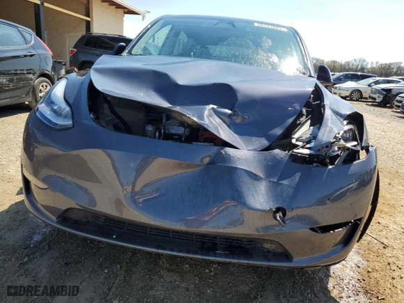 2023 Tesla Model Y Long Range with VIN 7SAYGDEE5PA159439, listed as a Copart auction lot 50743885 with 28,505 mi miles and Salvage Title. Bid and sale history available at carsss.com. Image 5.