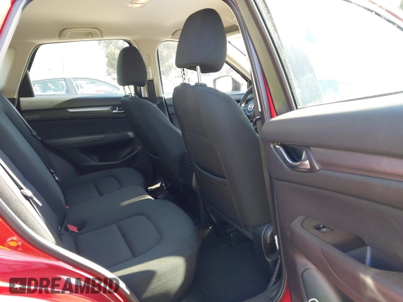 2019 Mazda CX-5 Sport with VIN JM3KFABM0K1633065, listed as a IAAI auction lot 41968786 with 90,407 mi miles and . Bid and sale history available at DreamBid. Image 8.
