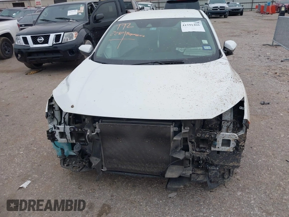 2020 Honda Civic LX with VIN 19XFC2F62LE021811, listed as a IAAI auction lot 41591466 with 75,797 mi miles and . Bid and sale history available at DreamBid. Image 13.