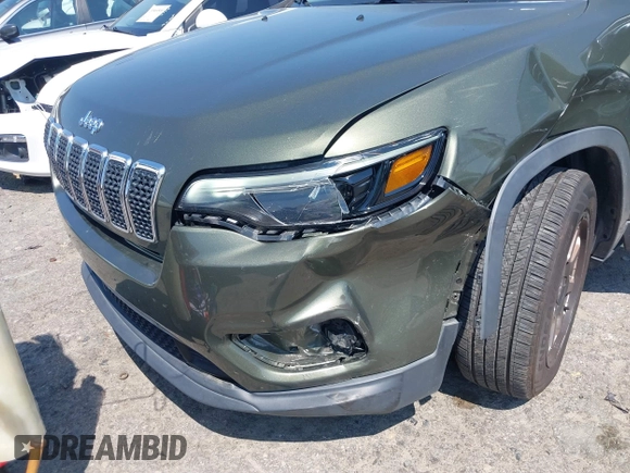 2019 Jeep Cherokee Latitude with VIN 1C4PJLCB9KD109451, listed as a IAAI auction lot 39941419 with 131,236 mi miles. Bid and sale history available at carsss.com. Image 6.