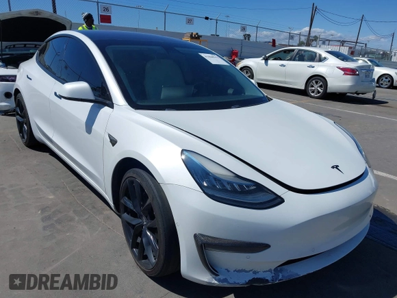 2019 Tesla Model 3 Mid Range with VIN 5YJ3E1EA5KF327181, listed as a IAAI auction lot 41860943 with 157,335 mi miles and . Bid and sale history available at DreamBid. Image 6.