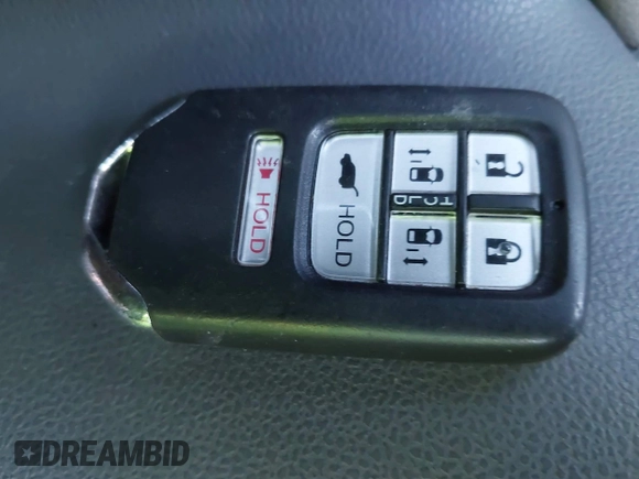 2017 Honda Odyssey EX-L with VIN 5FNRL5H62HB022308, listed as a IAAI auction lot 41213635 with 97,161 mi miles and . Bid and sale history available at DreamBid. Image 11.