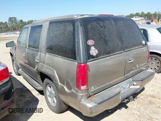 2000 Cadillac Escalade z VIN 1GYEK63R2YR209125, wystawiony jako IAAI lot #41854270 z przebiegiem 198 017 mil mil oraz . Historia ofert i sprzedaży dostępna na DreamBid. Obrazek 3.