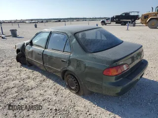 2000 Toyota Corolla VE with VIN 1NXBR12E5YZ387383, listed as a Copart auction lot 78931374 with 162,008 mi miles and Salvage title. Bid and sale history available at DreamBid. Image 2.