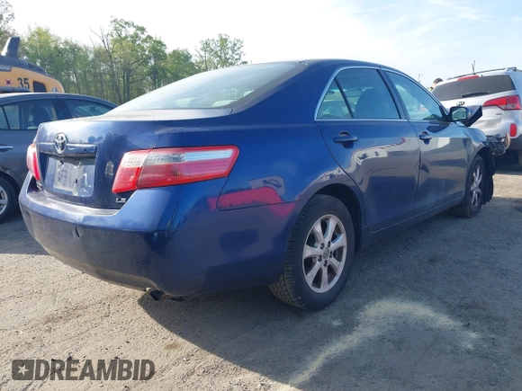 2009 Toyota Camry with VIN 4T1BE46K59U415794, listed as a IAAI auction lot 42048872 with 142,200 mi miles. Bid and sale history available at carsss.com. Image 4.