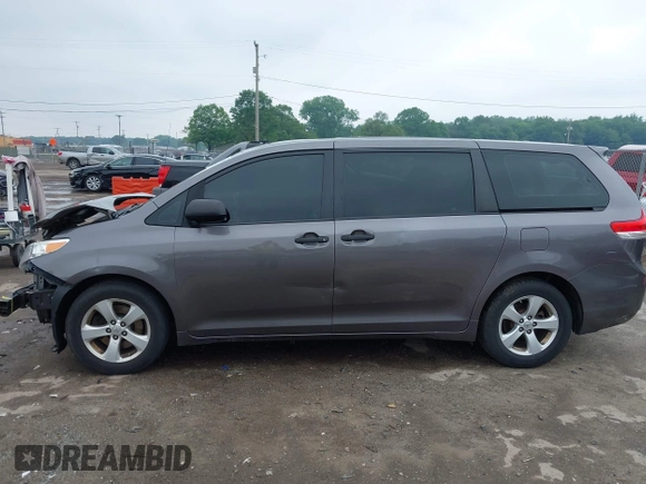 2014 Toyota Sienna L with VIN 5TDZK3DC5ES439593, listed as a IAAI auction lot 42420219 with 136,544 mi miles and . Bid and sale history available at DreamBid. Image 15.
