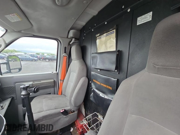 2010 Ford Econoline Cargo Commercial with VIN 1FTNE1EWXADA91296, listed as a IAAI auction lot 42571036 with 154,626 mi miles and . Bid and sale history available at DreamBid. Image 15.