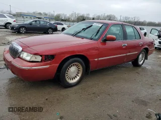 2000 Mercury Grand Marquis LS z VIN 2MEFM75WXYX726819, wystawiony jako Copart lot #52873675 z przebiegiem 144 692 mil mil oraz Nie do naprawy. Historia ofert i sprzedaży dostępna na DreamBid. Obrazek 1.
