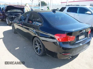 2014 BMW 3 Series 328i with VIN WBA3C1C59EK108093, listed as a IAAI auction lot 41965358 with 113,351 mi miles. Bid and sale history available at carsss.com. Image 3.