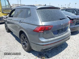 2023 Volkswagen Tiguan SE R-Line Black with VIN 3VV8B7AX3PM018096, listed as a IAAI auction lot 42174933 with 25,742 mi miles and . Bid and sale history available at DreamBid. Image 3.