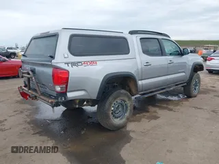 2017 Toyota Tacoma SR5 with VIN 3TMCZ5AN8HM051829, listed as a IAAI auction lot 41616329 with 64,113 mi miles and . Bid and sale history available at DreamBid. Image 4.