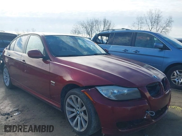 2011 BMW 3 Series 328i xDrive with VIN WBAPK7C56BF195818, listed as a IAAI auction lot 41946092 with 167,848 mi miles. Bid and sale history available at carsss.com. Image 1.