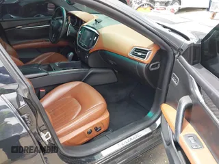2014 Maserati Ghibli S Q4 with VIN ZAM57RTA0E1101059, listed as a IAAI auction lot 42121292 with 107,901 mi miles and . Bid and sale history available at DreamBid. Image 5.