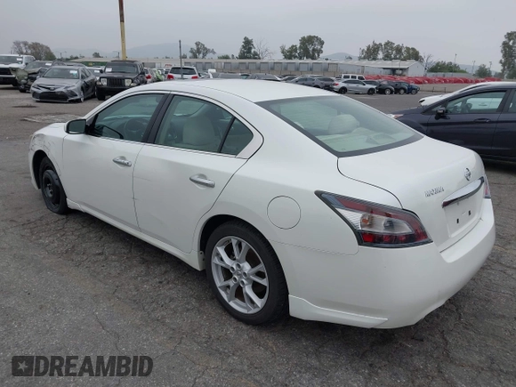 2014 Nissan Maxima S with VIN 1N4AA5AP7EC499224, listed as a IAAI auction lot 42014369 with 74,399 mi miles and . Bid and sale history available at DreamBid. Image 3.