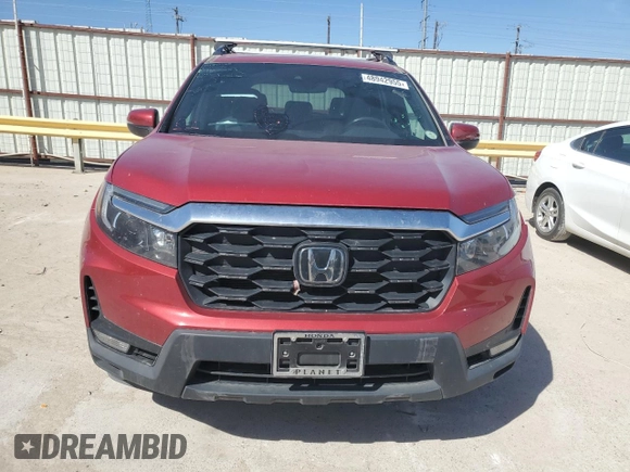 2023 Honda Passport EX-L with VIN 5FNYF8H57PB007264, listed as a Copart auction lot 48942955 with 18,013 mi miles and Salvage Title. Bid and sale history available at DreamBid. Image 5.