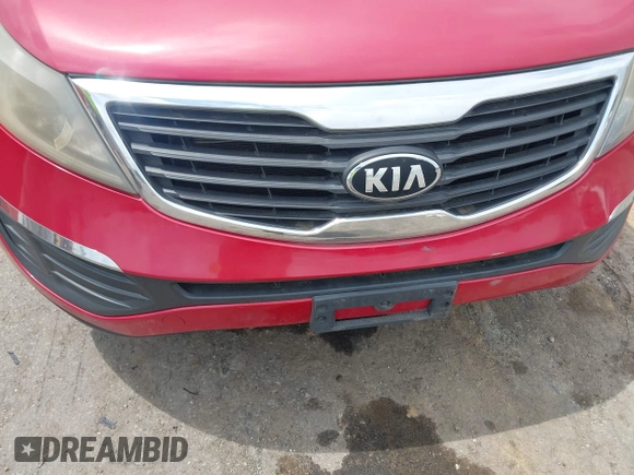 2013 Kia Sportage LX z VIN KNDPB3A20D7380934, wystawiony jako IAAI lot #42764553 z przebiegiem 203 688 mil mil oraz . Historia ofert i sprzedaży dostępna na DreamBid. Obrazek 6.