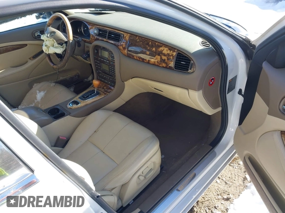 2005 Jaguar S-Type with VIN SAJWA01T75FN17656, listed as a IAAI auction lot 41282140 with 126,631 mi miles and . Bid and sale history available at DreamBid. Image 5.