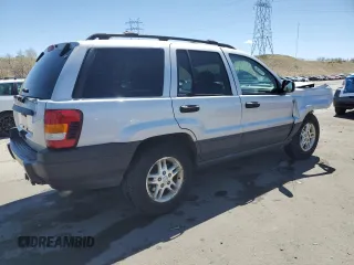 2004 Jeep Grand Cherokee Laredo with VIN 1J4GW48S34C430923, listed as a Copart auction lot 53742105 with 194,372 mi miles and Salvage Title. Bid and sale history available at carsss.com. Image 3.