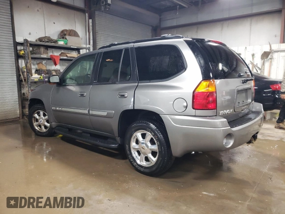 2005 GMC Envoy SLE with VIN 1GKDT13S952334233, listed as a Copart auction lot 85115854 with 221,131 mi miles and Salvage Title. Bid and sale history available at carsss.com. Image 2.