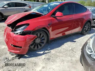 2022 Tesla Model Y Performance with VIN 7SAYGDEF9NF510183, listed as a Copart auction lot 61263405 with 19,411 mi miles and Salvage title. Bid and sale history available at DreamBid. Image 1.