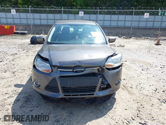 2012 Ford Focus SE with VIN 1FAHP3F22CL456552, listed as a IAAI auction lot 42341696 with 129,699 mi miles and . Bid and sale history available at DreamBid. Image 12.