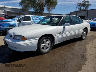 1999 Pontiac Bonneville SE z VIN 1G2HX52K3XH226172, wystawiony jako Copart lot #71655164 z przebiegiem 242 429 mil mil oraz Szkoda całkowita • Salvage title. Historia ofert i sprzedaży dostępna na DreamBid. Obrazek 1.