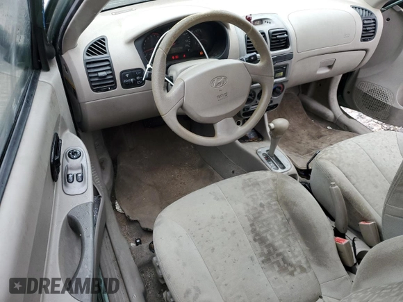 2003 Hyundai Accent GL with VIN KMHCG35C23U264701, listed as a Copart auction lot 80029154 with 142,090 mi miles and Salvage Title. Bid and sale history available at carsss.com. Image 8.