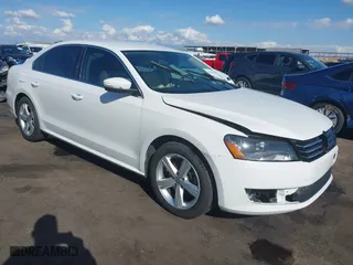 2014 Volkswagen Passat SE w/Sunroof with VIN 1VWBS7A38EC115632, listed as a IAAI auction lot 41426159 with 119,213 mi miles. Bid and sale history available at carsss.com. Image 1.